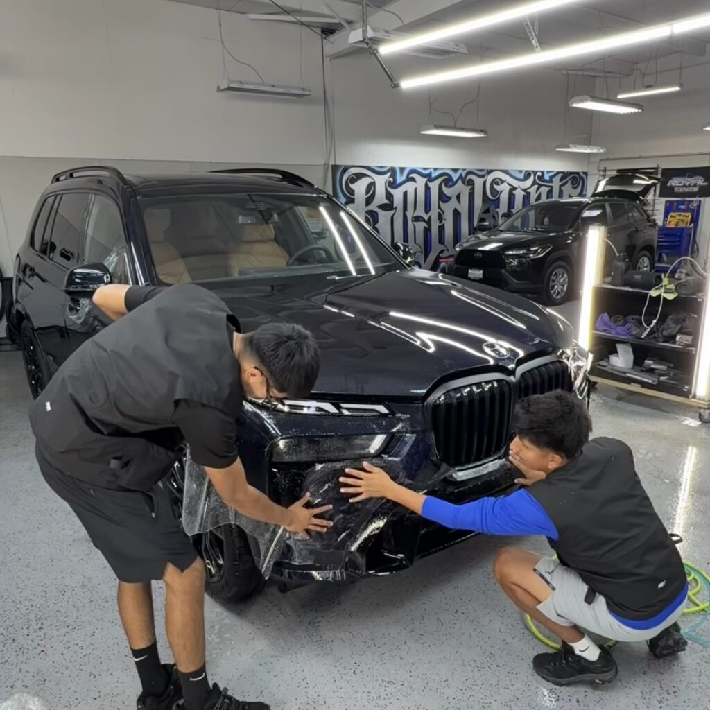 DYNOshield PPF being installed on black BMW SUV in Santa Rosa