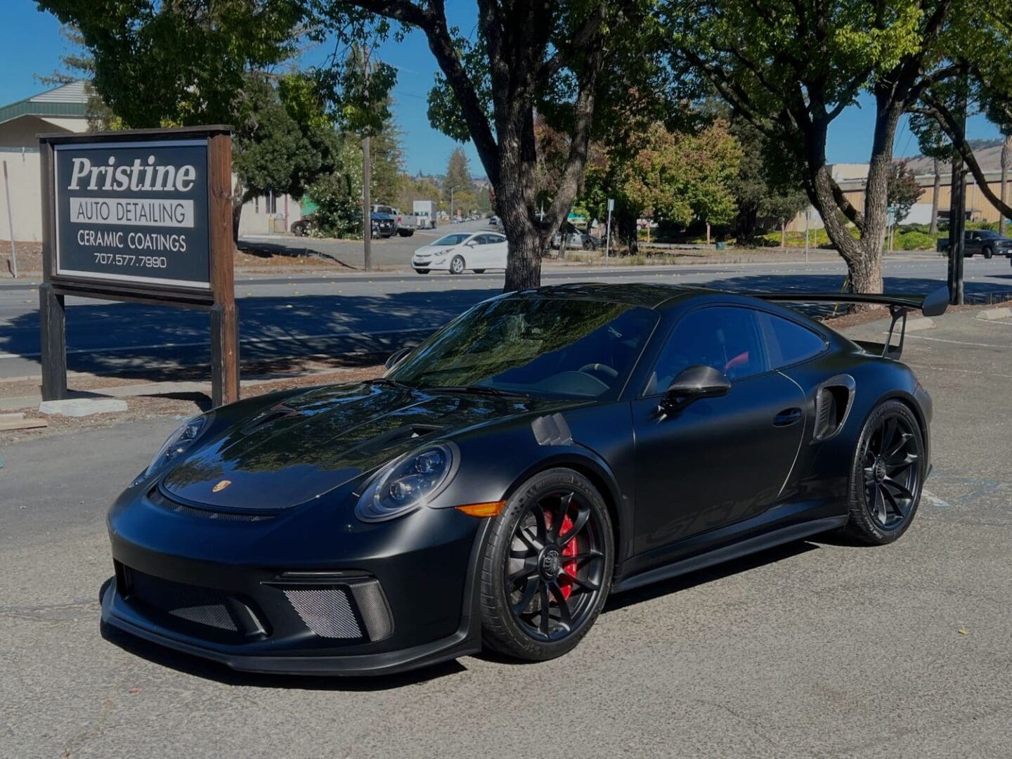 Matte black Porsche after ceramic coating installation