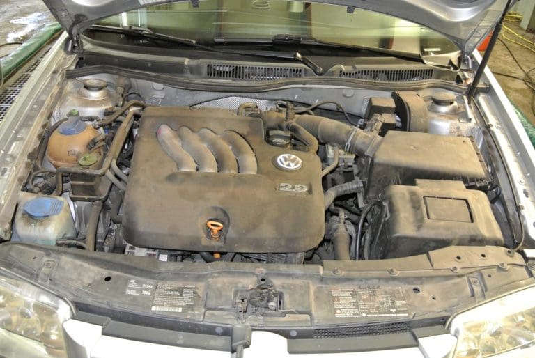 Volkswagen engine bay before engine detail service