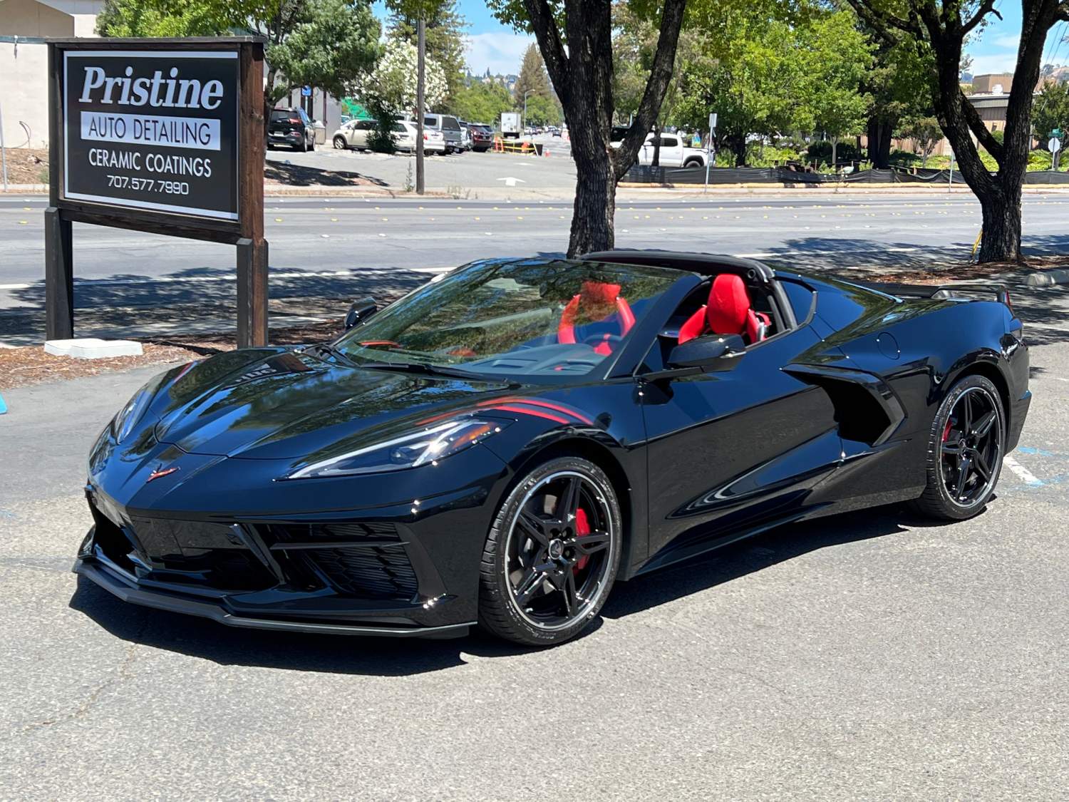 Black convertible C8 after ceramic coating installation